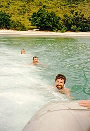 Mike, Jim and Cheryl being dragged behind dinghy