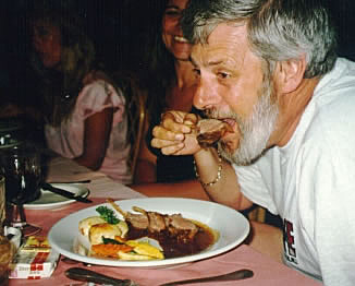 Art enjoying rack of lamb