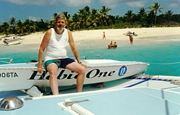 Art sitting on the Hobie One sailboat