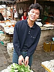 Firendly sales person, open air market, Beijing