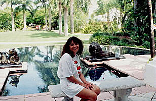 Anne sitting by the fountain at the Hyatt