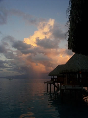 Setting Sun with overwater huts
